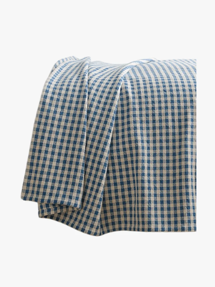 Image may contain: Tablecloth, Cushion, Home Decor, Clothing, Skirt, and Blanket