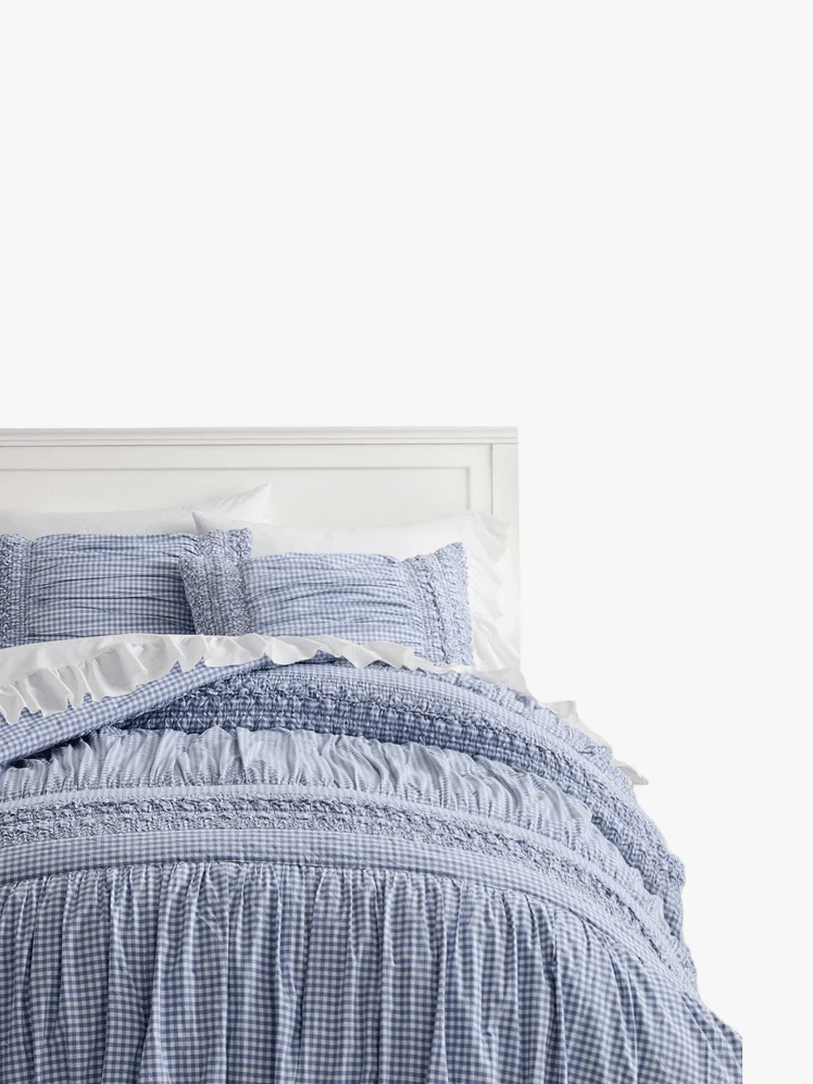 Image may contain: Bed, Furniture, Home Decor, Linen, Blanket, Cushion, Bedroom, Indoors, and Room