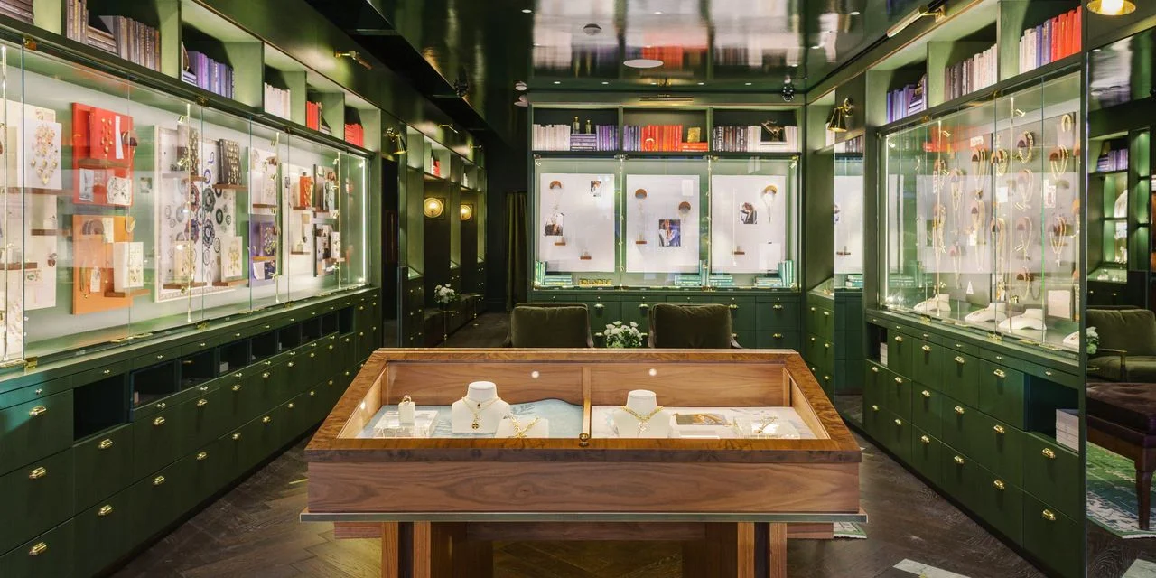 Image may contain Architecture Building Accessories Jewelry Necklace Jewelry Store Shop Chair Furniture and Indoors