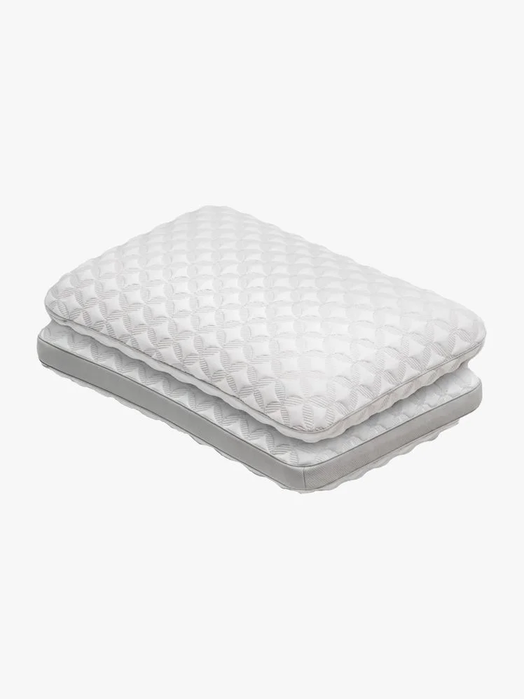 Two latex pillows with a diamond textured fabric weave.