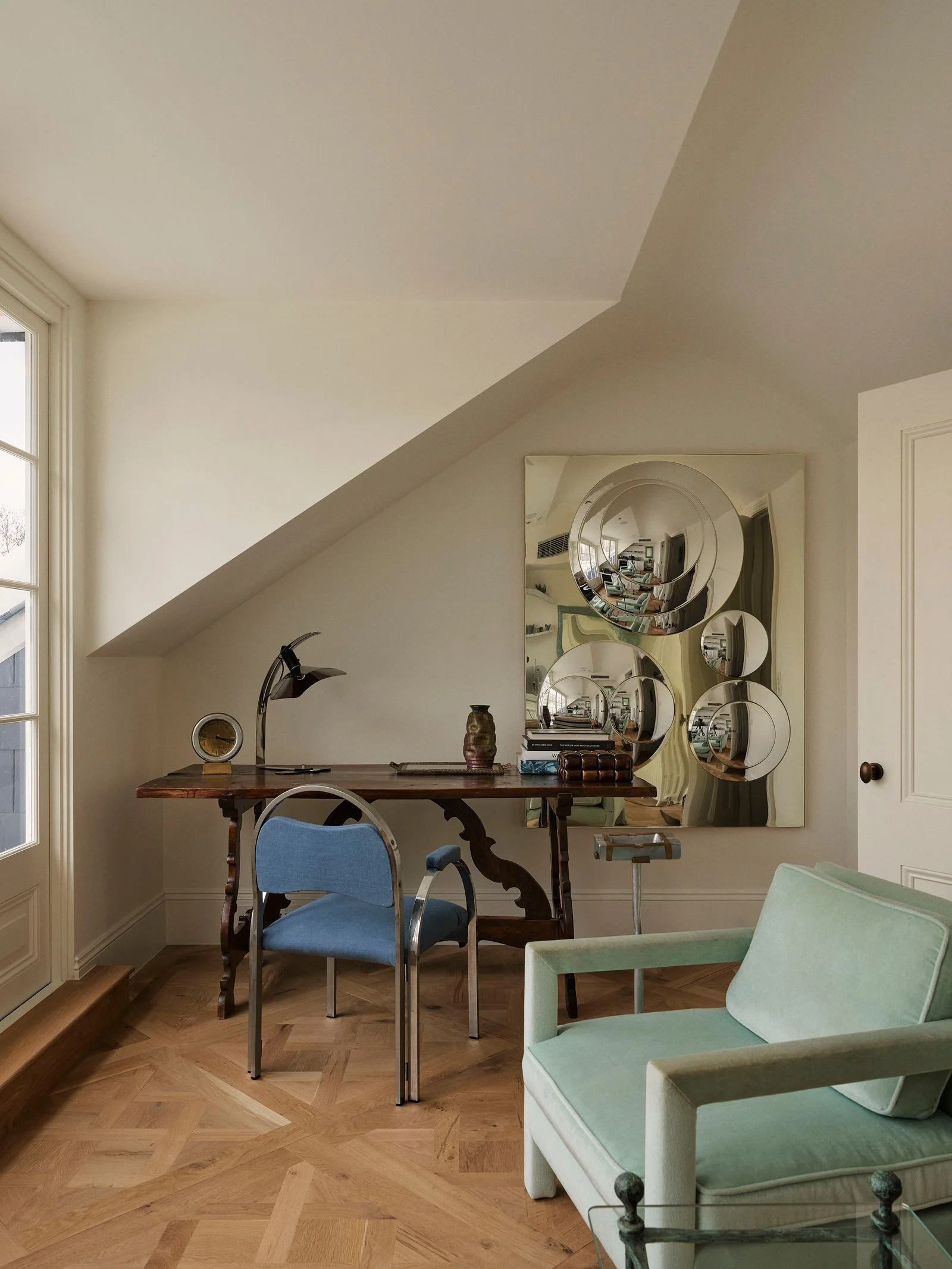 Image may contain Chair Furniture Architecture Building Indoors Living Room Room Table Desk and Interior Design