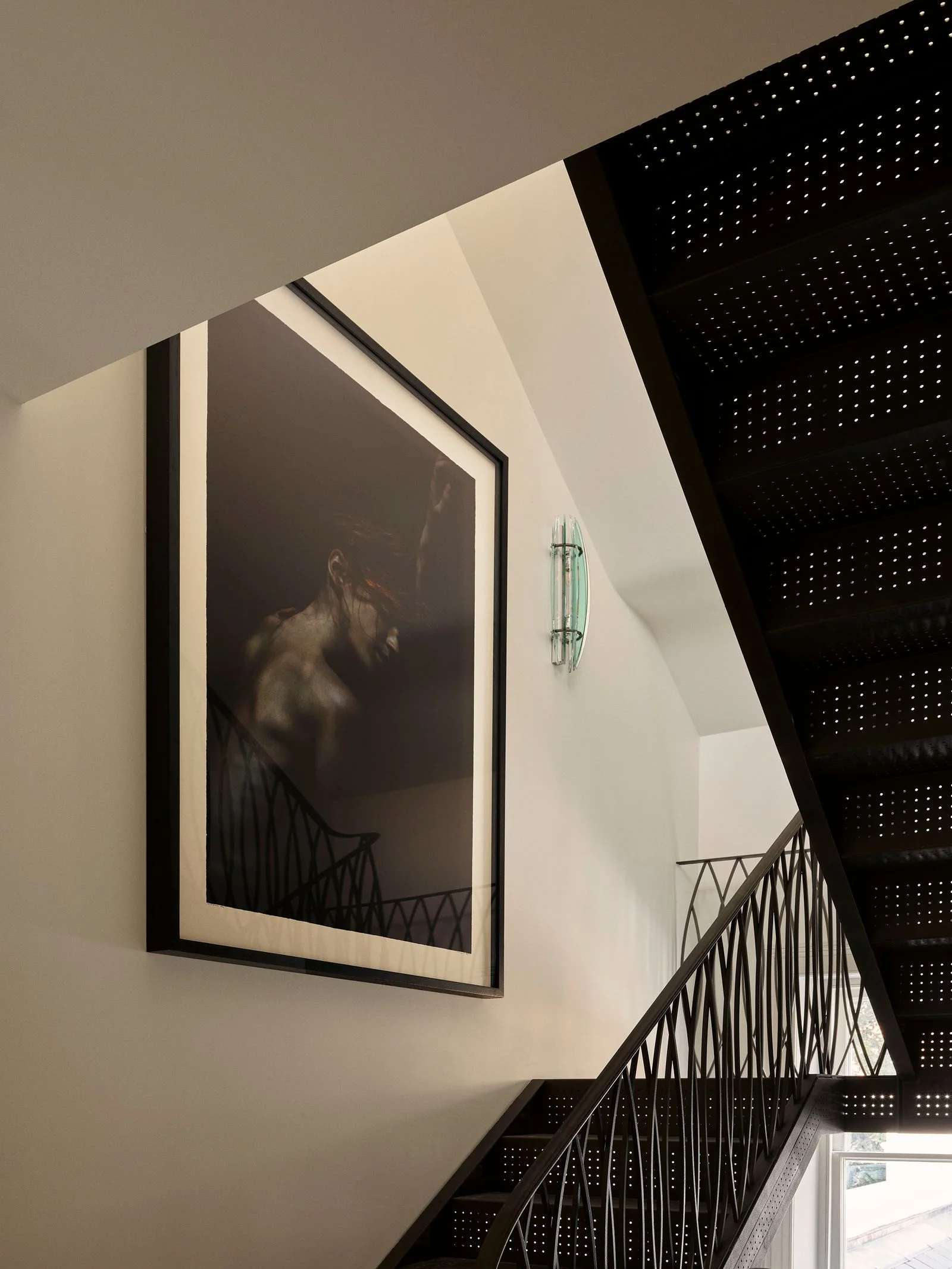 Image may contain Indoors Interior Design Architecture Building House Housing Staircase Adult Person and Art