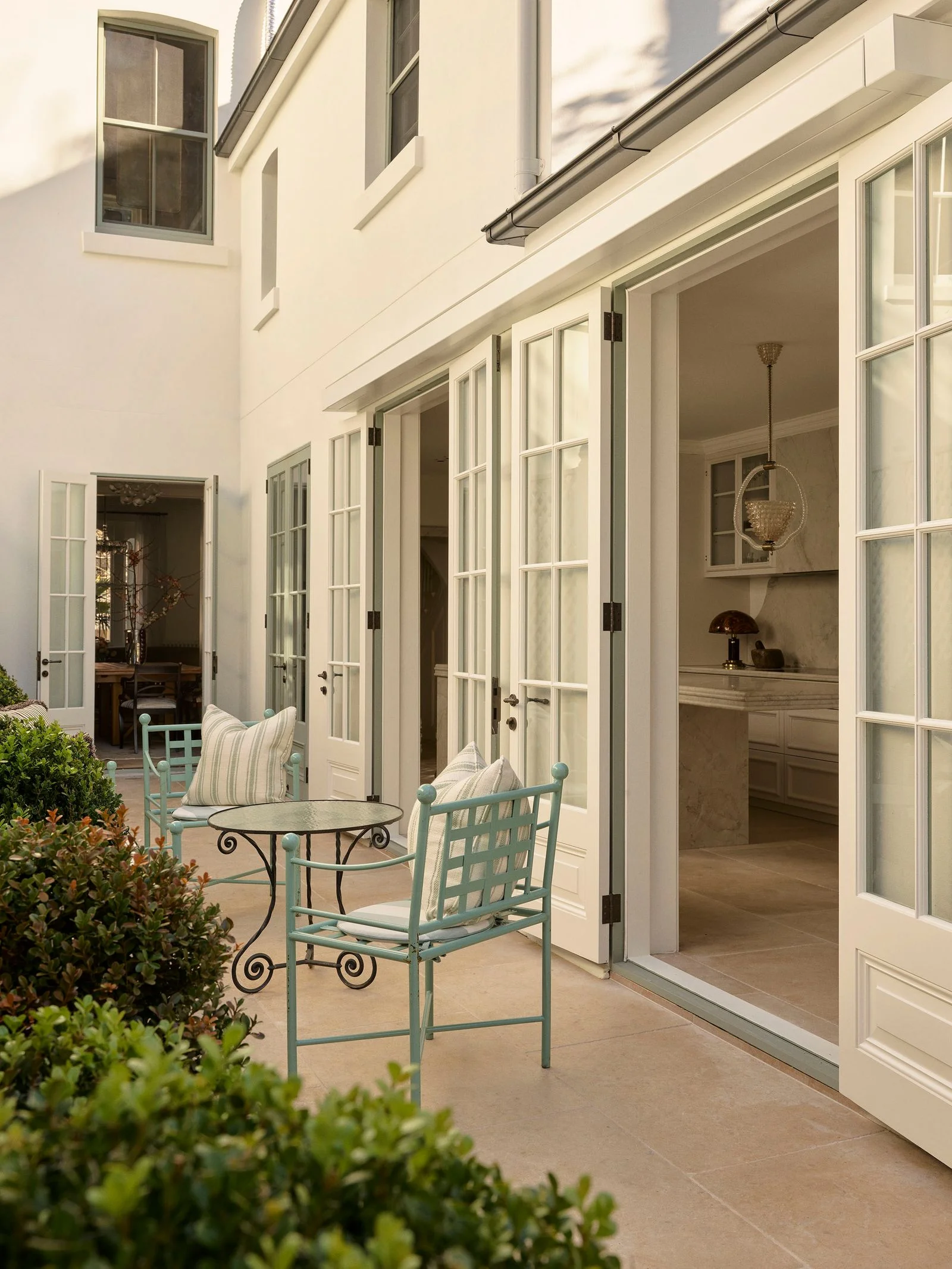 Image may contain Door Architecture Building Housing House Chair Furniture French Window and Window