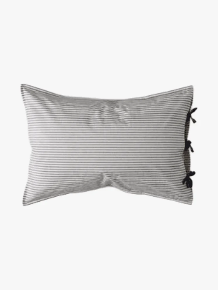 Image may contain: Cushion, Home Decor, Pillow, Accessories, Bag, and Handbag