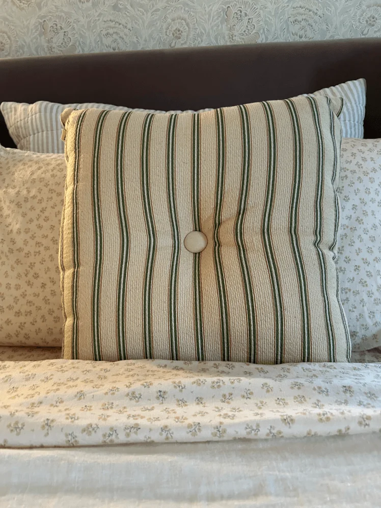 Image may contain: Cushion, Home Decor, Pillow, Couch, and Furniture