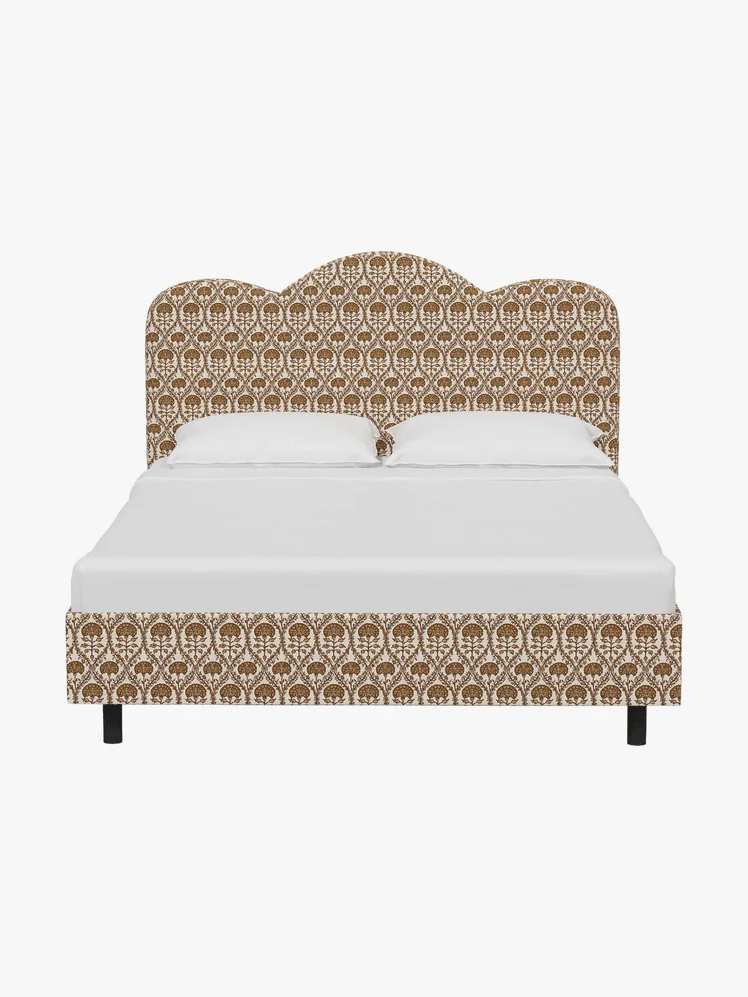Platform Bed in a eclectic pattern with a white mattress and pair of standard pillows
