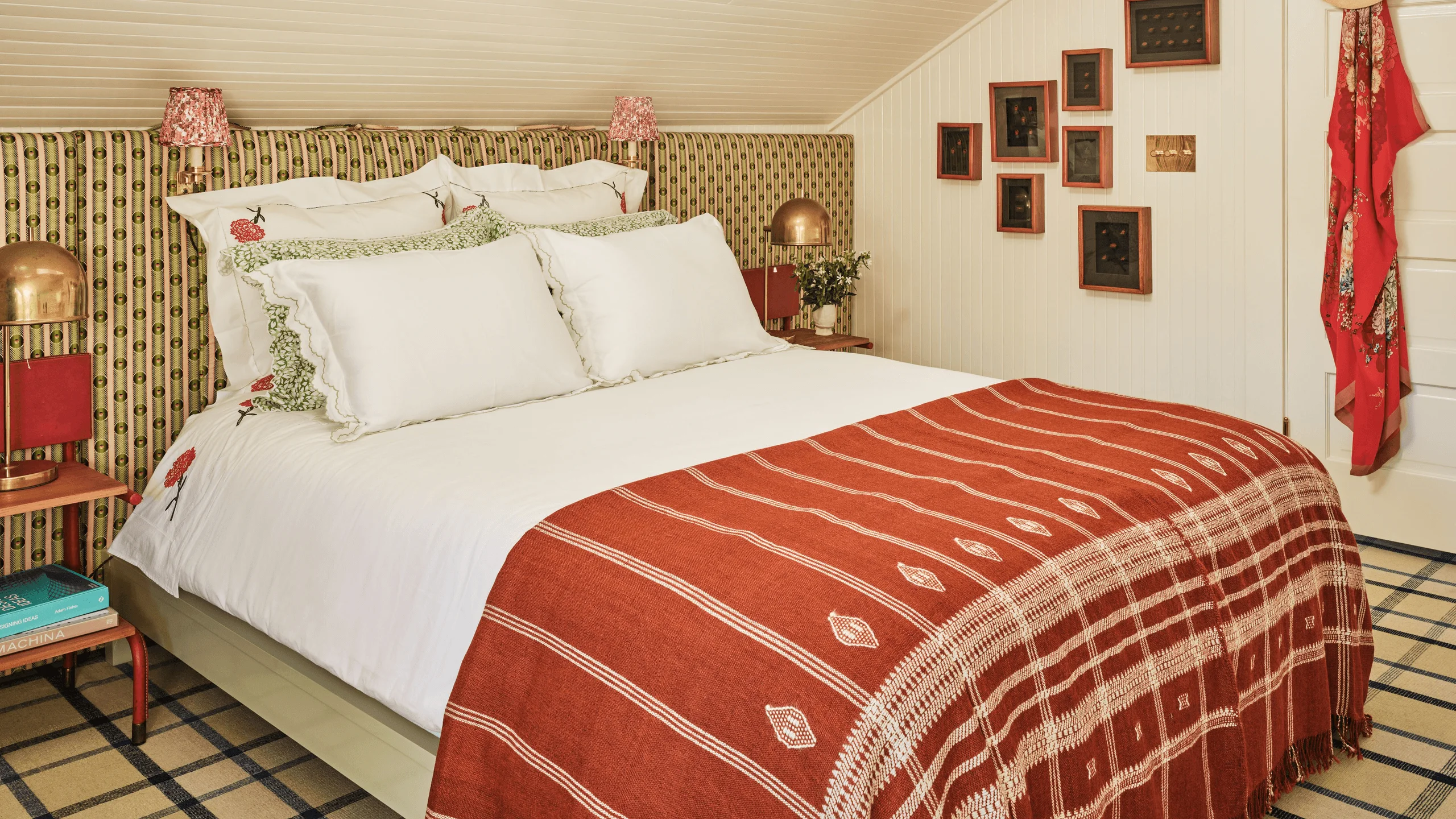 Bedroom with cottage style decor and a skylight.