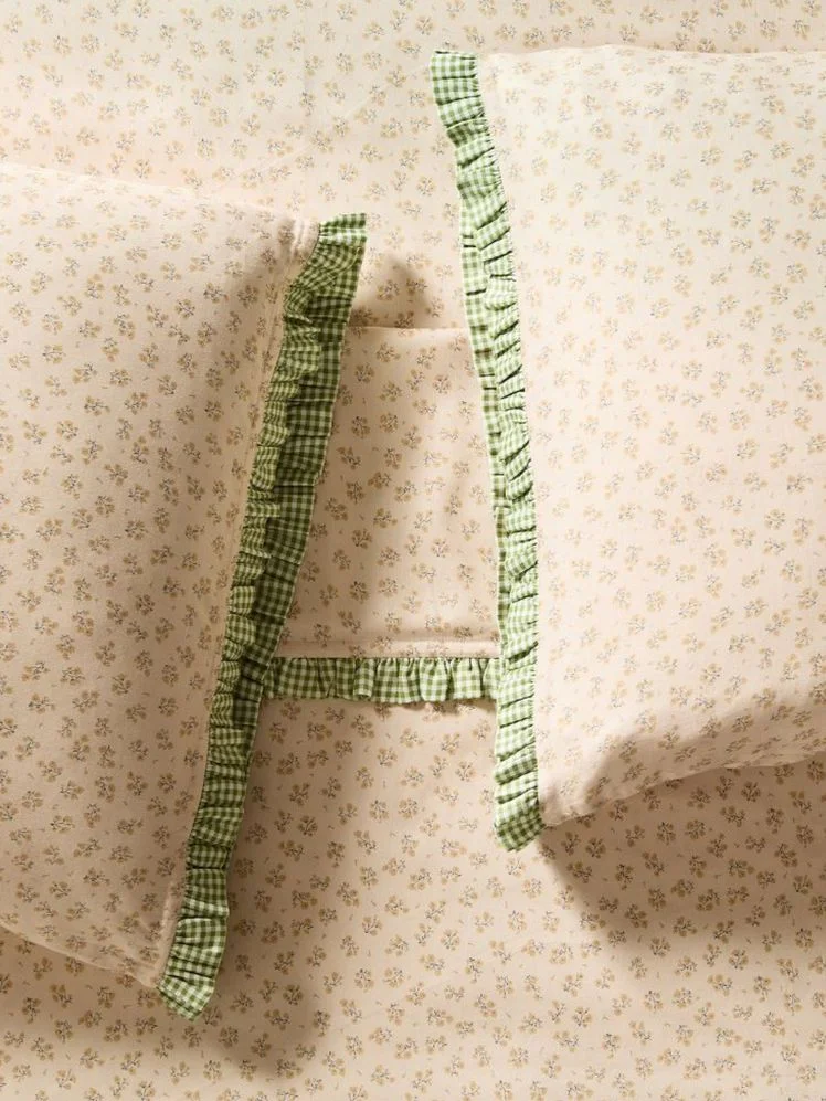 Image may contain: Cushion, Home Decor, Pillow, and Furniture